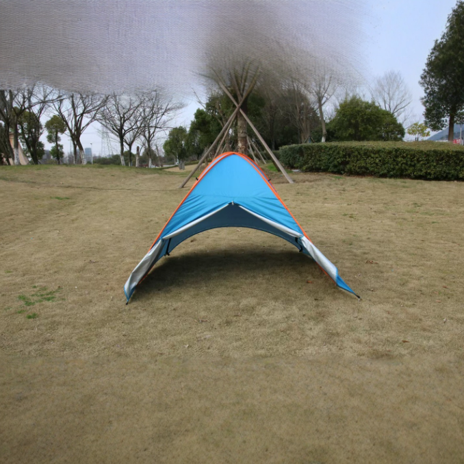 Sunshade and UV protection tent for beach with silver coating for shading and sun protection, suitable for outdoor activities in the sea.